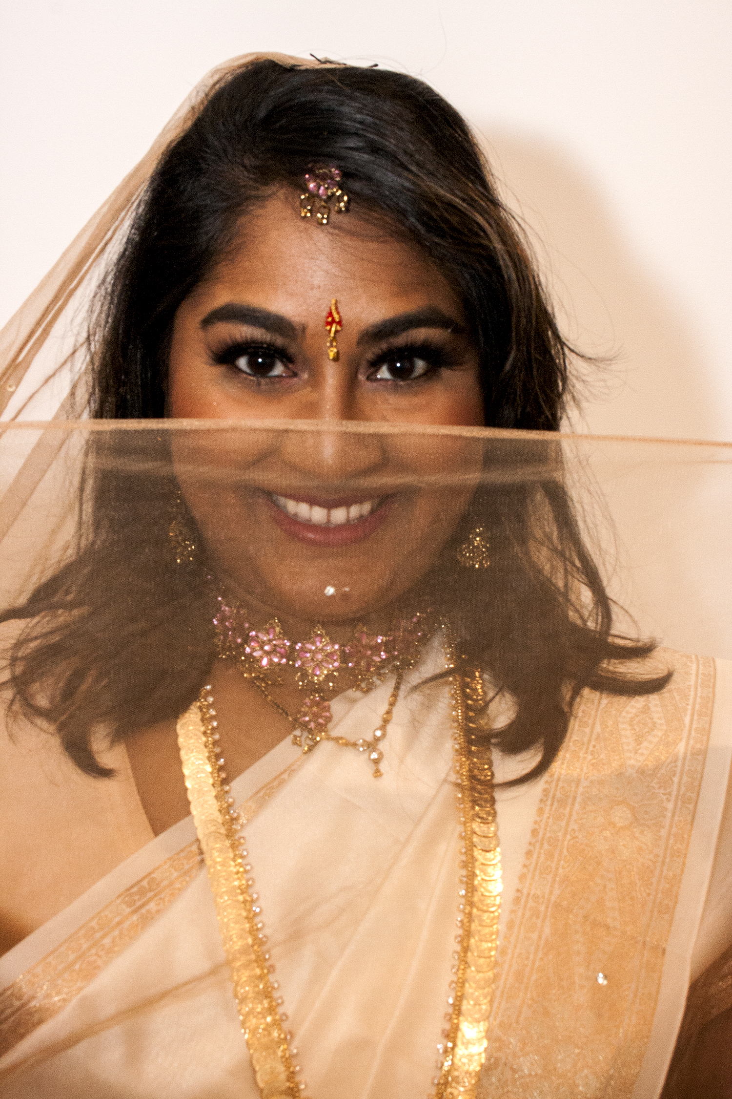 Aartie met gouden dupatta